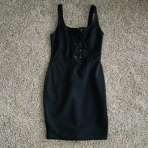 Beautiful black body-con cocktail dress.